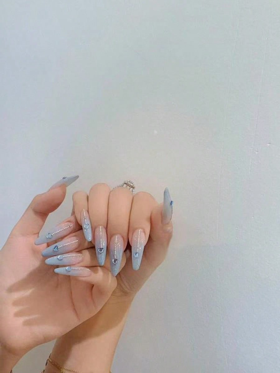 Long Stiletto Press-On Nails With Heart-Shaped Rhinestones, Blue Gradient Tips, Glitter Decorations, And Glossy Finish. This High-Quality Acrylic Nail Set Is Designed For Various Occasions To Add A Touch Of Elegance And Unique Charm To Your Nails.
