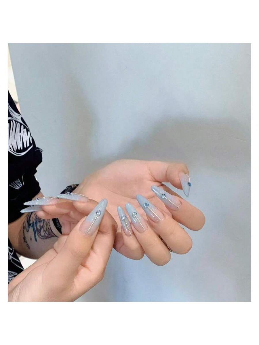 Long Stiletto Press-On Nails With Heart-Shaped Rhinestones, Blue Gradient Tips, Glitter Decorations, And Glossy Finish. This High-Quality Acrylic Nail Set Is Designed For Various Occasions To Add A Touch Of Elegance And Unique Charm To Your Nails.