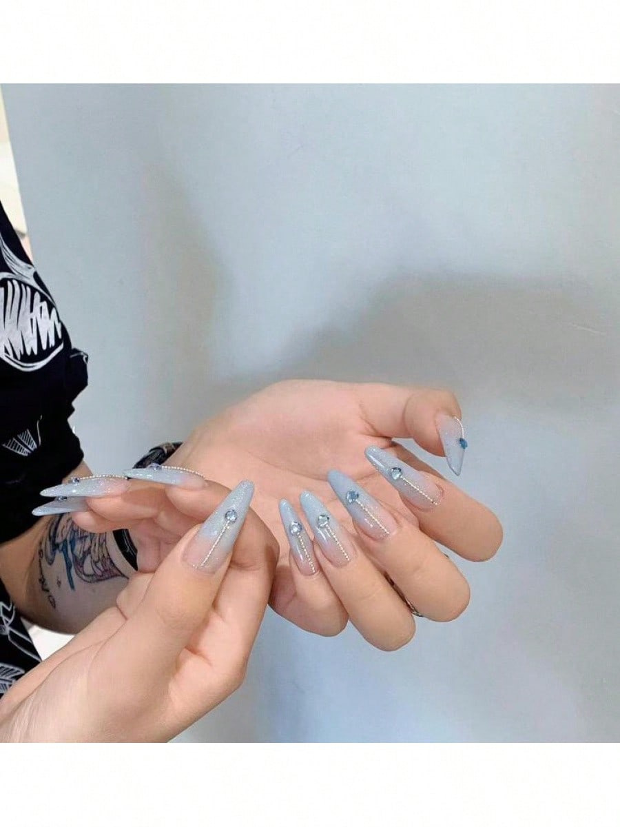Long Stiletto Press-On Nails With Heart-Shaped Rhinestones, Blue Gradient Tips, Glitter Decorations, And Glossy Finish. This High-Quality Acrylic Nail Set Is Designed For Various Occasions To Add A Touch Of Elegance And Unique Charm To Your Nails.