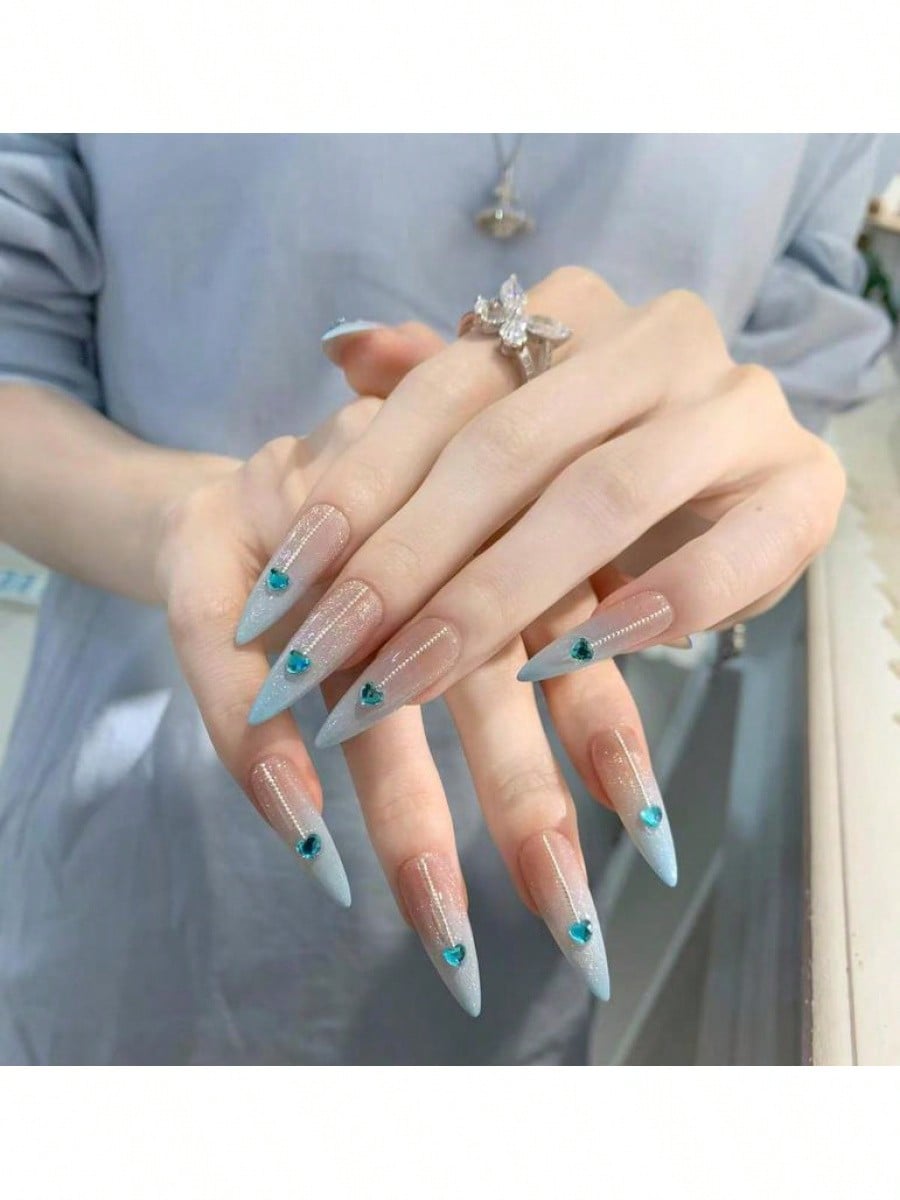 Long Stiletto Press-On Nails With Heart-Shaped Rhinestones, Blue Gradient Tips, Glitter Decorations, And Glossy Finish. This High-Quality Acrylic Nail Set Is Designed For Various Occasions To Add A Touch Of Elegance And Unique Charm To Your Nails.