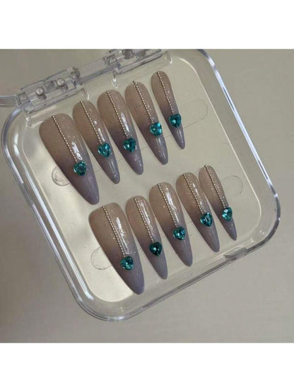 Long Stiletto Press-On Nails With Heart-Shaped Rhinestones, Blue Gradient Tips, Glitter Decorations, And Glossy Finish. This High-Quality Acrylic Nail Set Is Designed For Various Occasions To Add A Touch Of Elegance And Unique Charm To Your Nails.