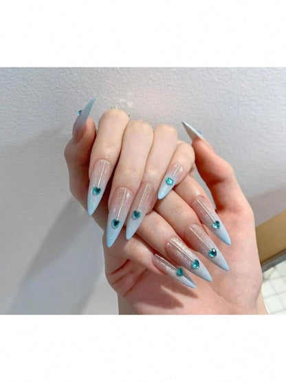 Long Stiletto Press-On Nails With Heart-Shaped Rhinestones, Blue Gradient Tips, Glitter Decorations, And Glossy Finish. This High-Quality Acrylic Nail Set Is Designed For Various Occasions To Add A Touch Of Elegance And Unique Charm To Your Nails.