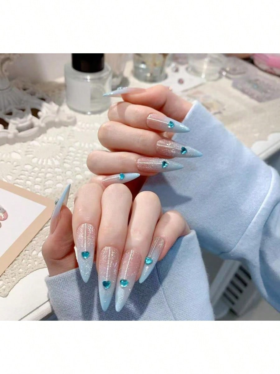 Long Stiletto Press-On Nails With Heart-Shaped Rhinestones, Blue Gradient Tips, Glitter Decorations, And Glossy Finish. This High-Quality Acrylic Nail Set Is Designed For Various Occasions To Add A Touch Of Elegance And Unique Charm To Your Nails.