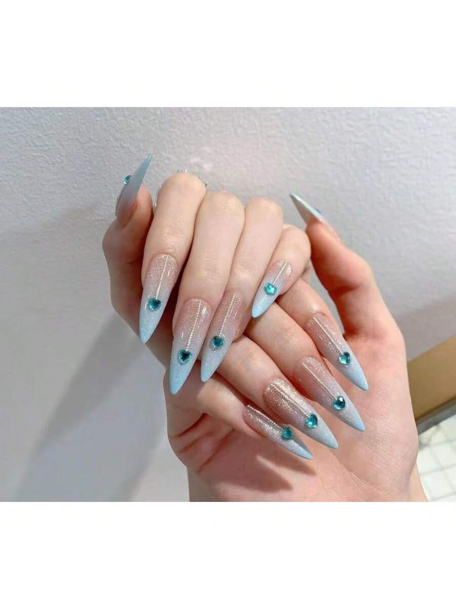 Long Stiletto Press-On Nails With Heart-Shaped Rhinestones, Blue Gradient Tips, Glitter Decorations, And Glossy Finish. This High-Quality Acrylic Nail Set Is Designed For Various Occasions To Add A Touch Of Elegance And Unique Charm To Your Nails.